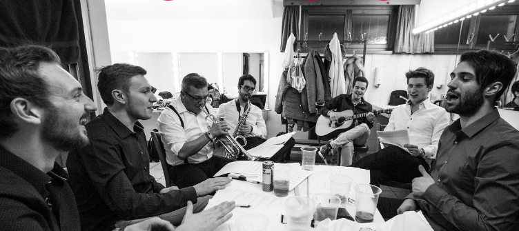 Team making music at the table